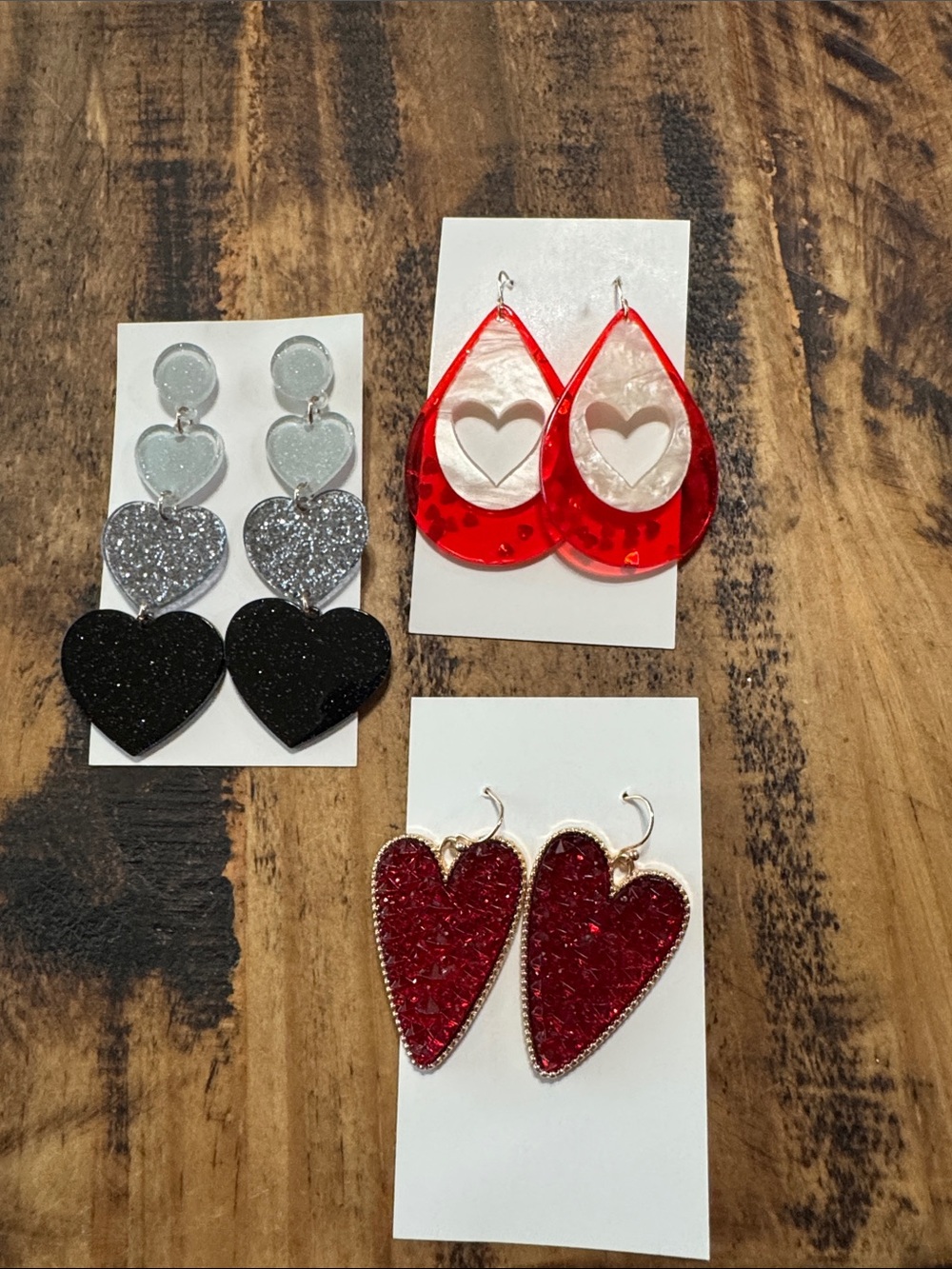 Lot of Hearts earrings.